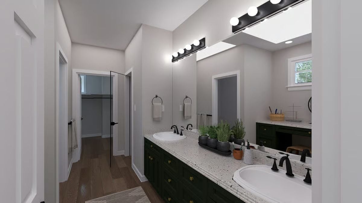 Matte Black Fixtures, Green Vanity, and a Double Sink Setup Built for Two