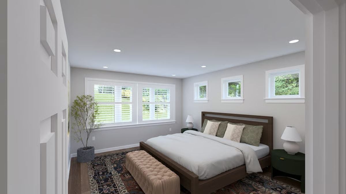 Walnut Bed Frame, Persian Rug, and Clerestory Windows That Pull Their Weight