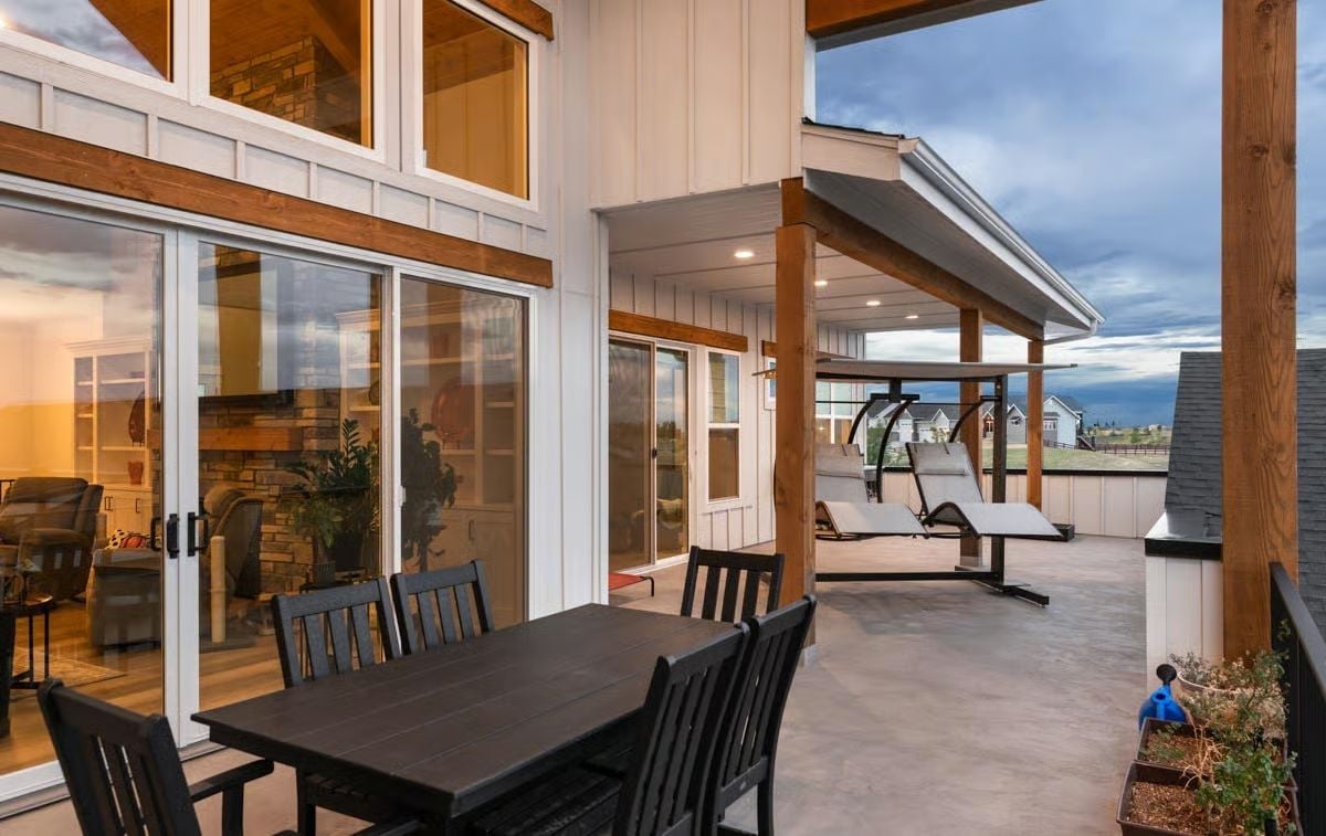 Covered Patio With Lounge Chairs and a Dining Set Built for the Long Haul