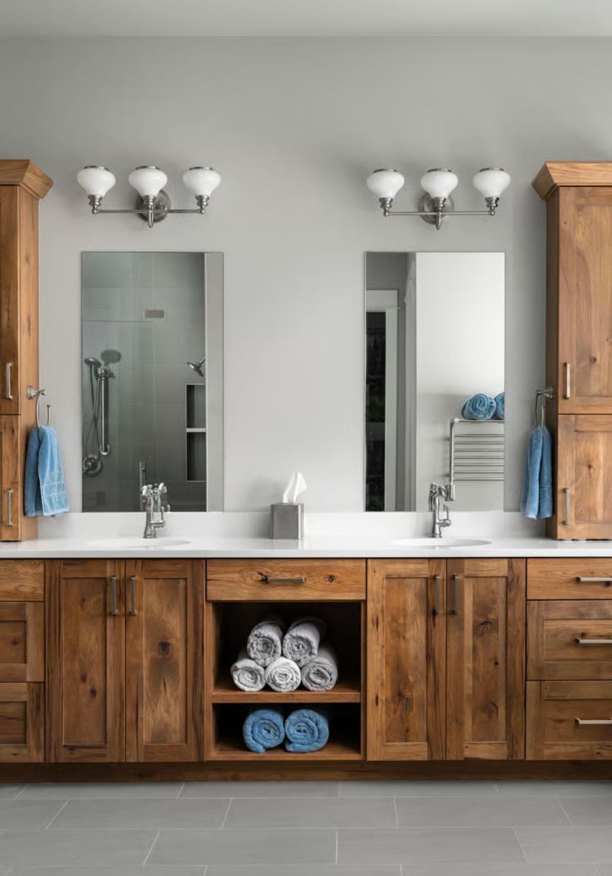 Knotty Wood Cabinetry and Rolled Towels That Make Storage Look Intentional