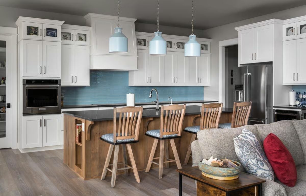 Light Blue Pendants and a Wood Island That Earn Their Place in a White Kitchen