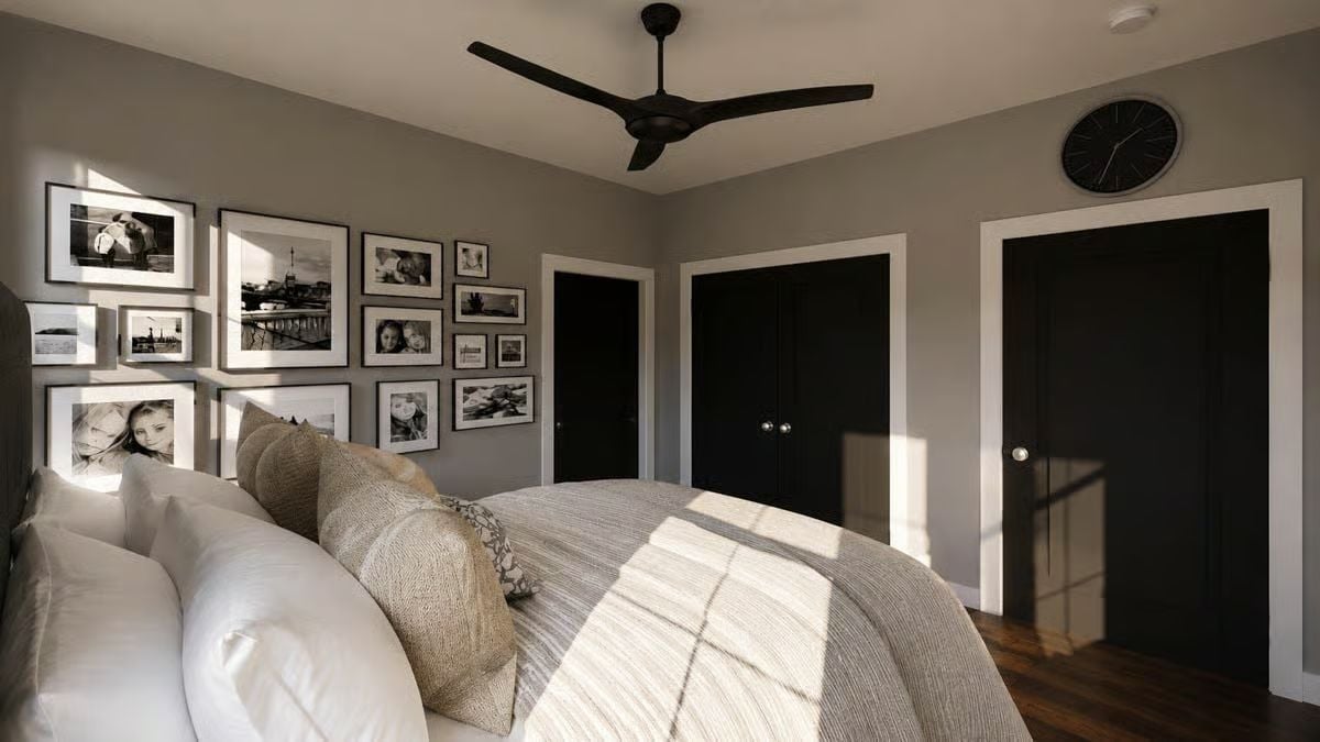 Black-and-White Gallery Wall That Makes the Bedroom Feel Like Someone Actually Lives There