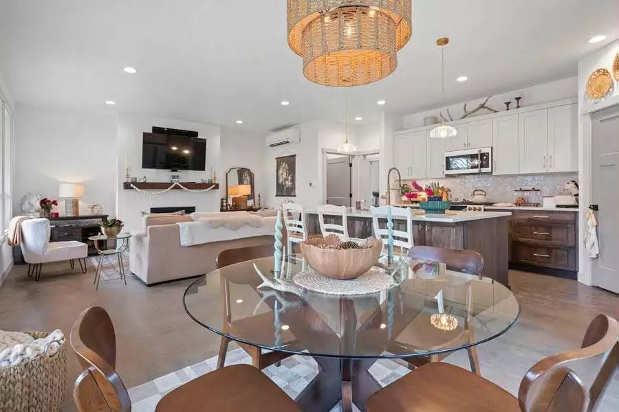 Rattan Chandelier, Glass Table, Two Rooms Playing Nice Together