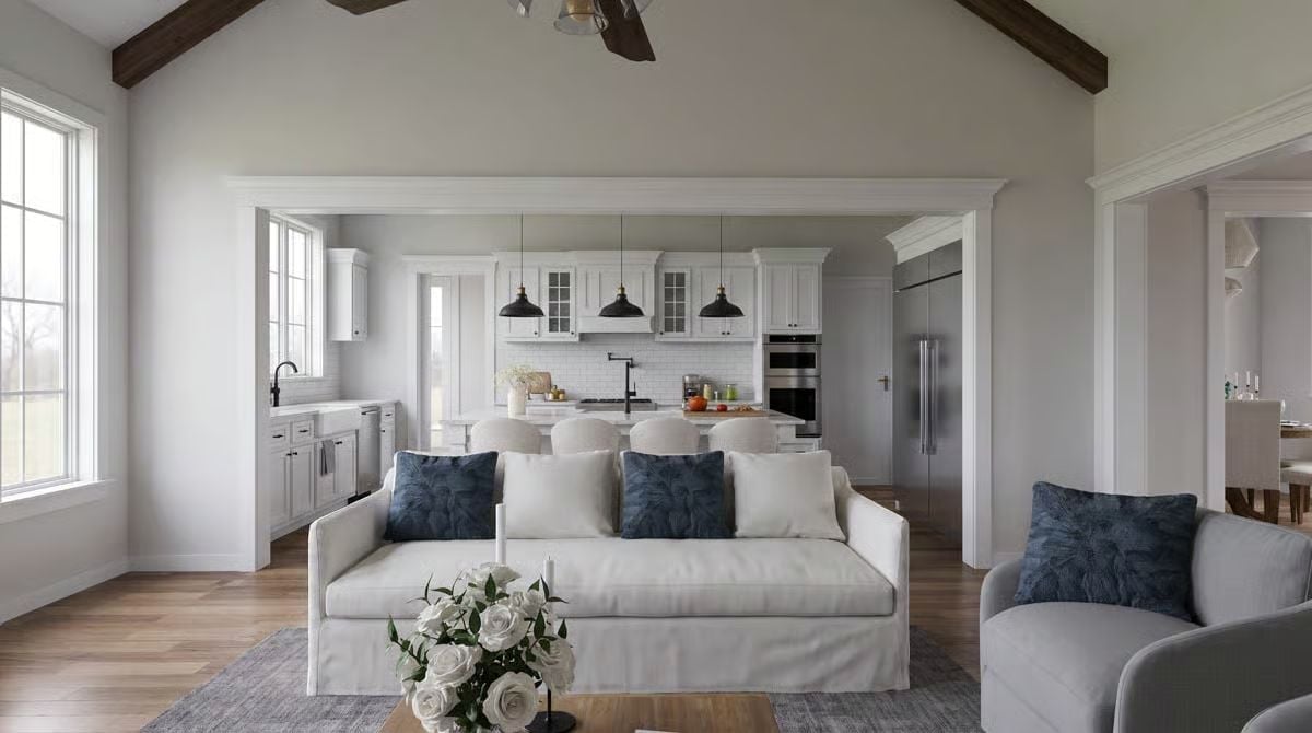 Vaulted Ceilings and Black Pendants Anchor the Open Living-to-Kitchen Flow