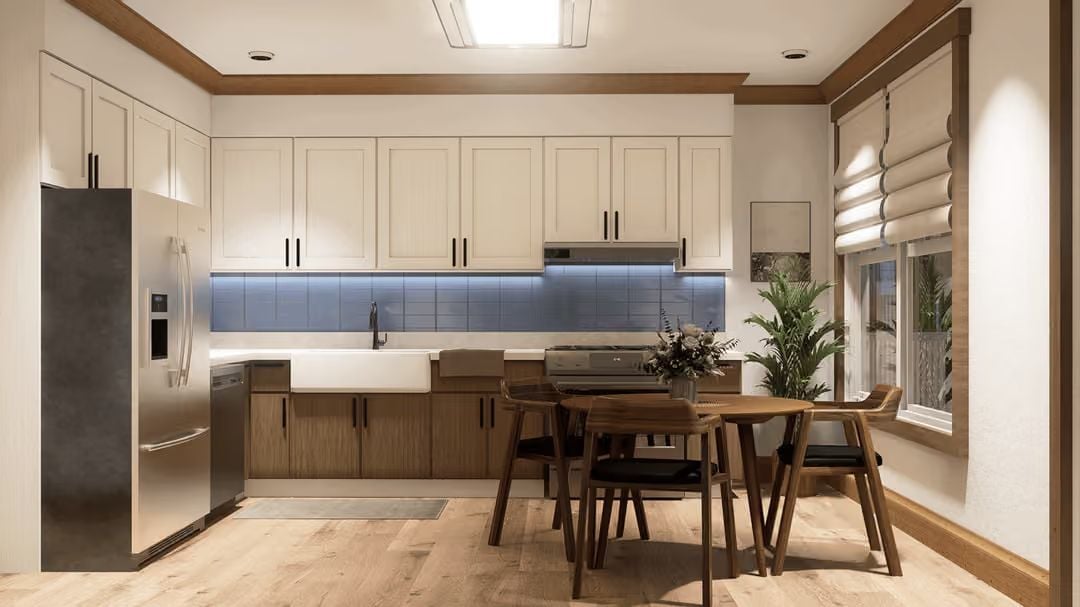 Blue Tile Backsplash and Two-Tone Cabinets Make This Kitchen Worth Lingering In