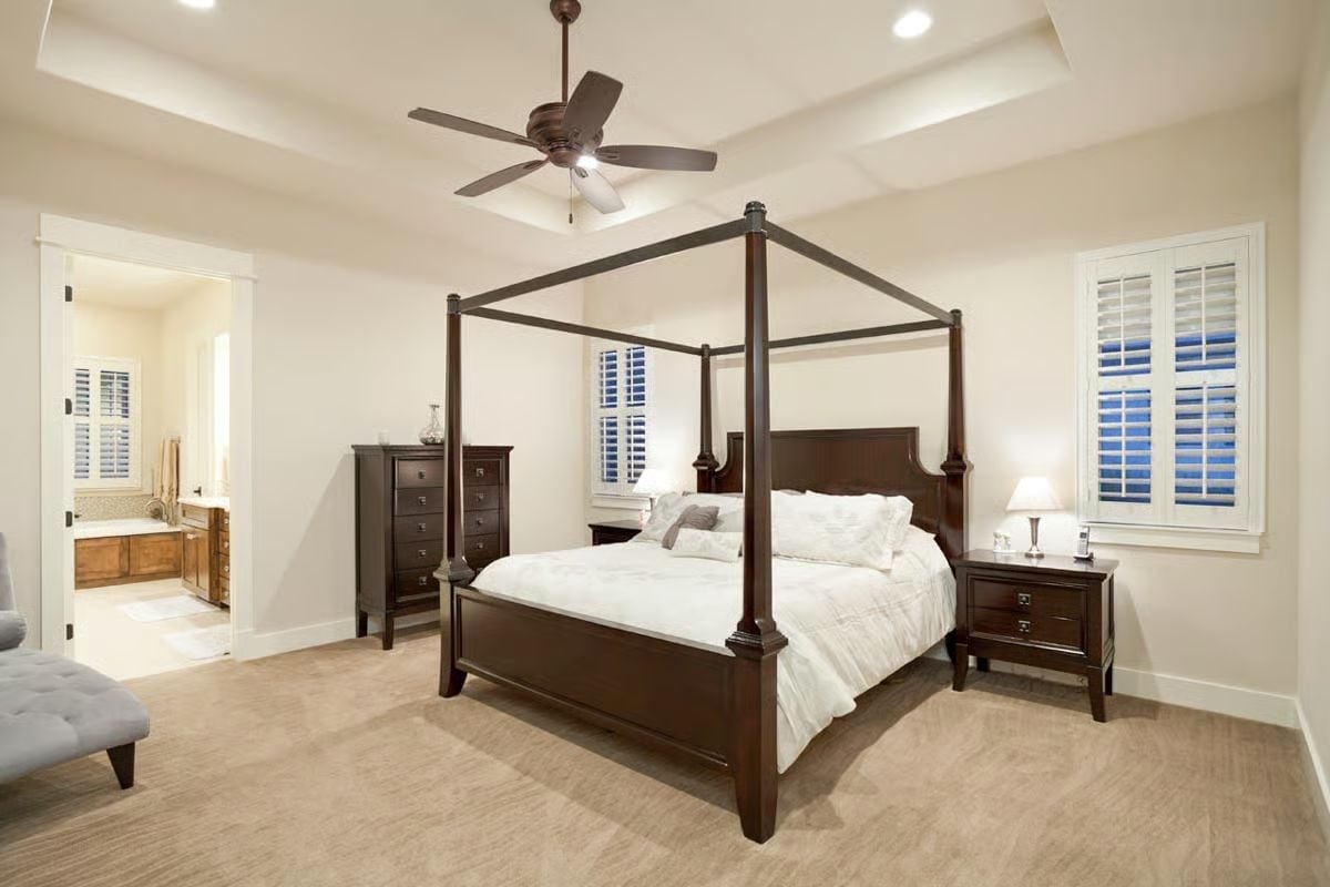 Four-Poster Frame, Tray Ceiling, and Shutters Doing Real Work