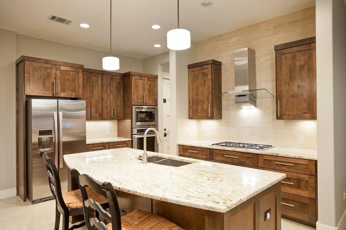Knotty Wood Cabinets and Granite That Pulls Its Weight