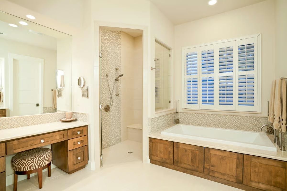 Zebra Stool, Plantation Shutters, and a Soaking Tub That Earned Its Corner