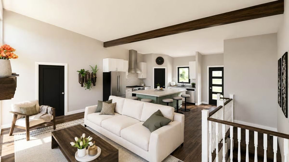 Exposed Beam Overhead, White Sofa Below, and an Open Kitchen That Doesn't Hide