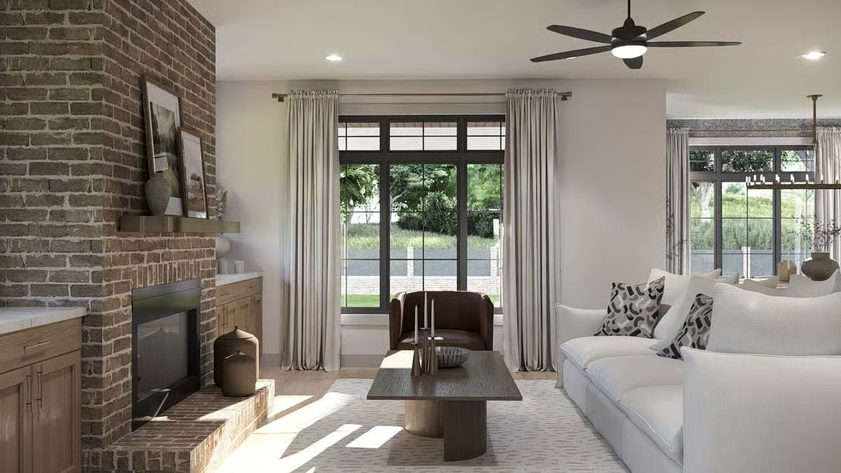 Exposed Brick Fireplace Wall and a Sofa That Looks Like It Weighs 400 Pounds