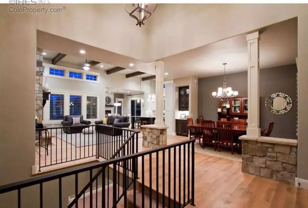 Stone Base Columns and Coffered Ceilings Earn Their Keep Here