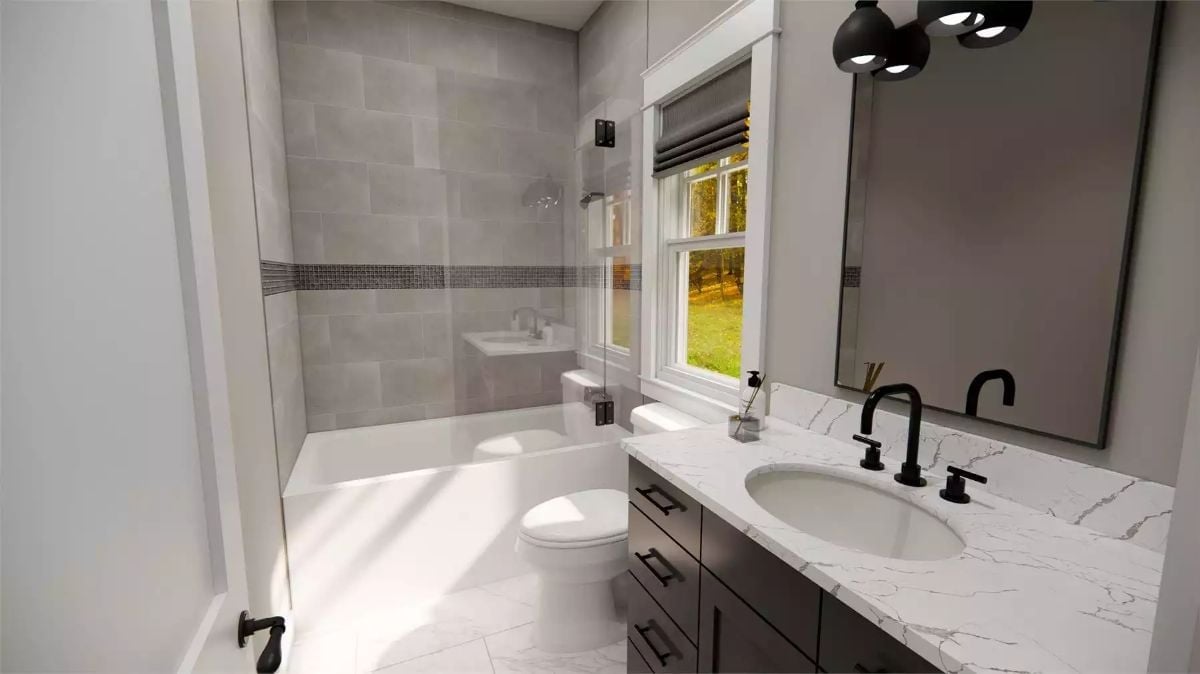 Marble Countertop, Matte Black Fixtures, and Tile That Knows Its Role