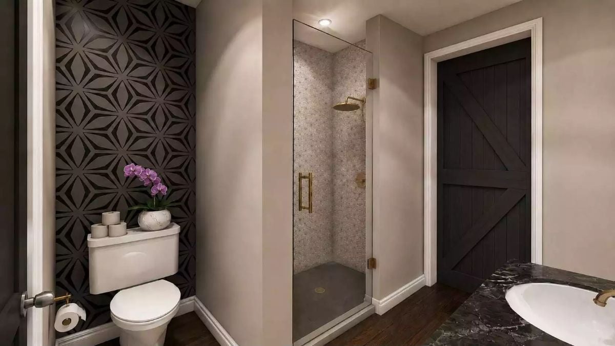 Gold Fixtures, Geometric Wallpaper, and a Shower Stall That Means Business
