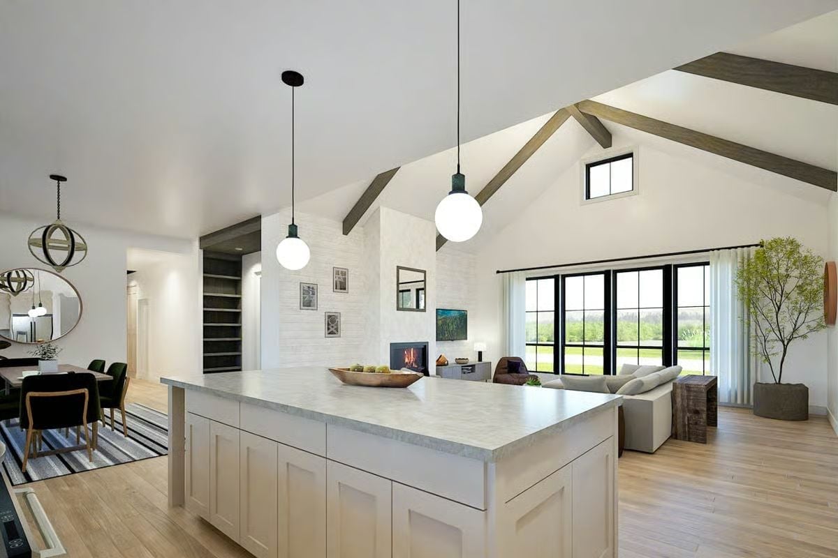 Marble Island, Globe Pendants, and a Fireplace Wall That Earns Its Square Footage