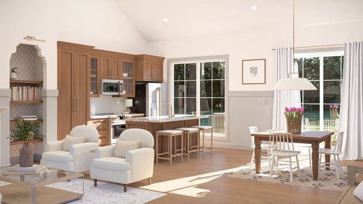 Warm Walnut Cabinetry and a Kitchen Island Built for Two Set the Tone Here