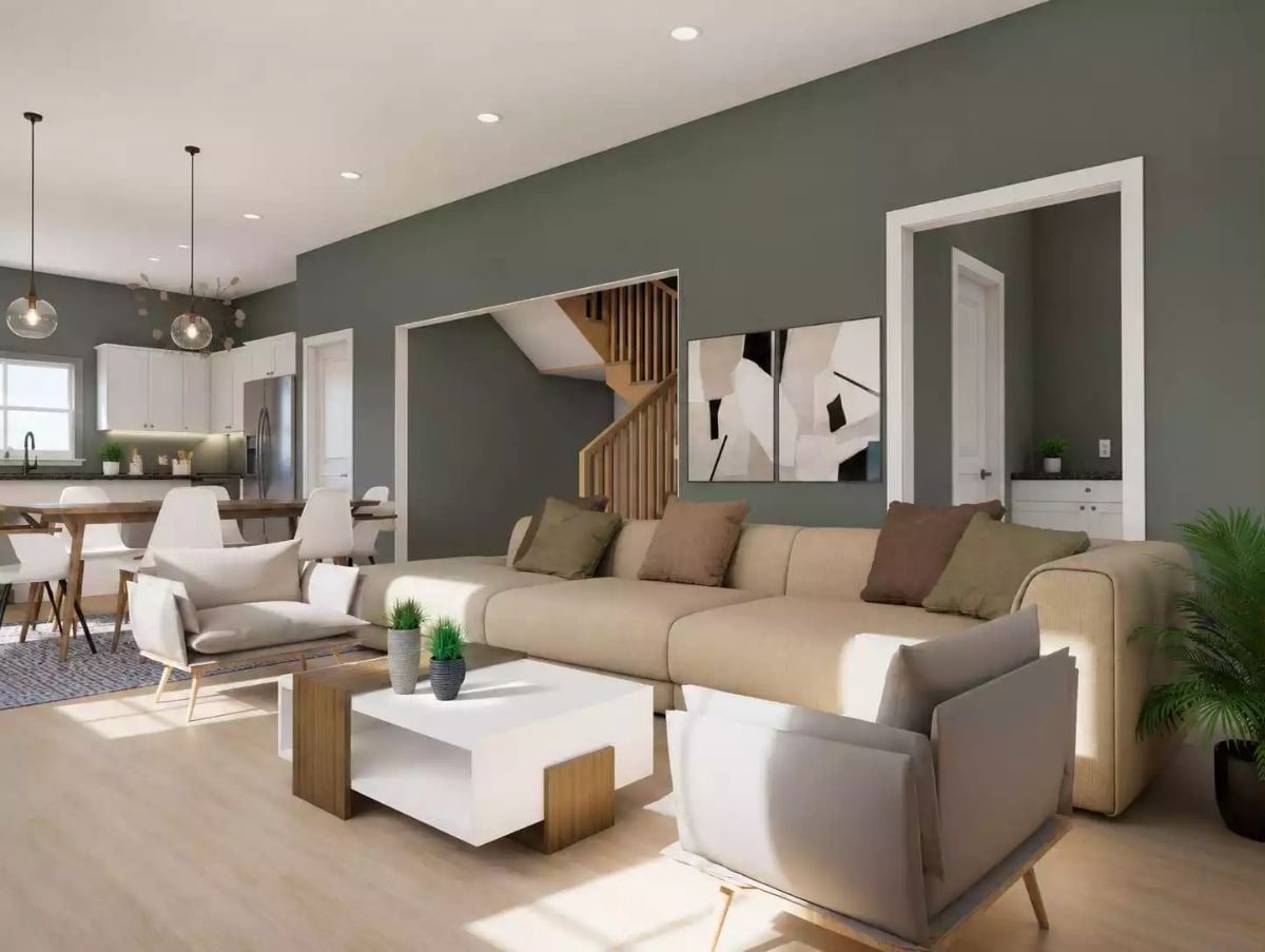 Sage Walls and Beige Upholstery Make This Open Living Space Feel Quietly Confident