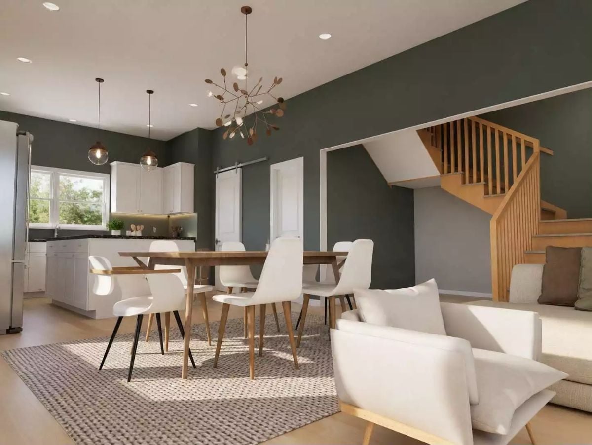 Warm Wood and Slate Walls Pull This Open-Plan Dining Space Together