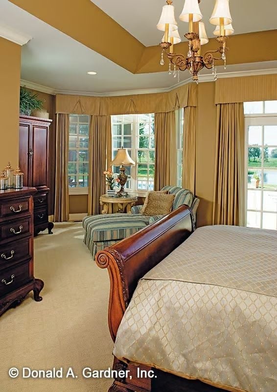 Mahogany Sleigh Bed and Chandelier That Set the Tone Before You Pull Back the Covers
