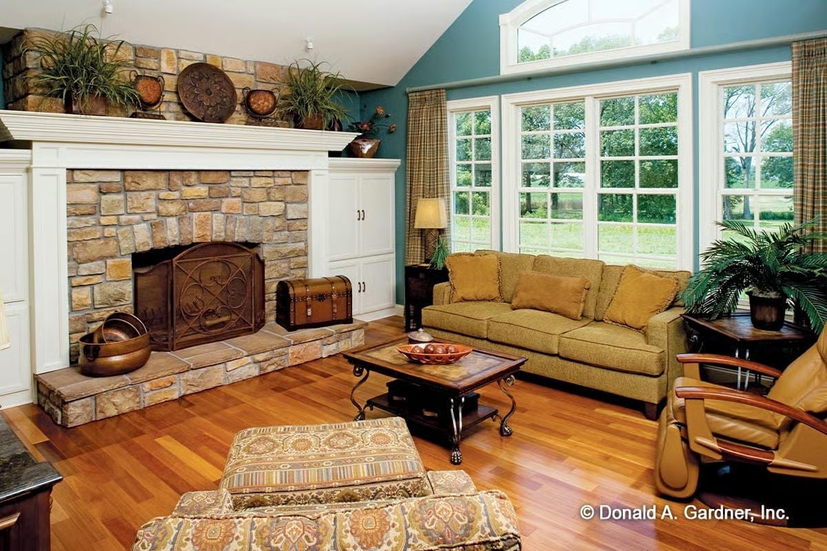 Teal Walls and a Stone Fireplace That Anchor Every Gathering