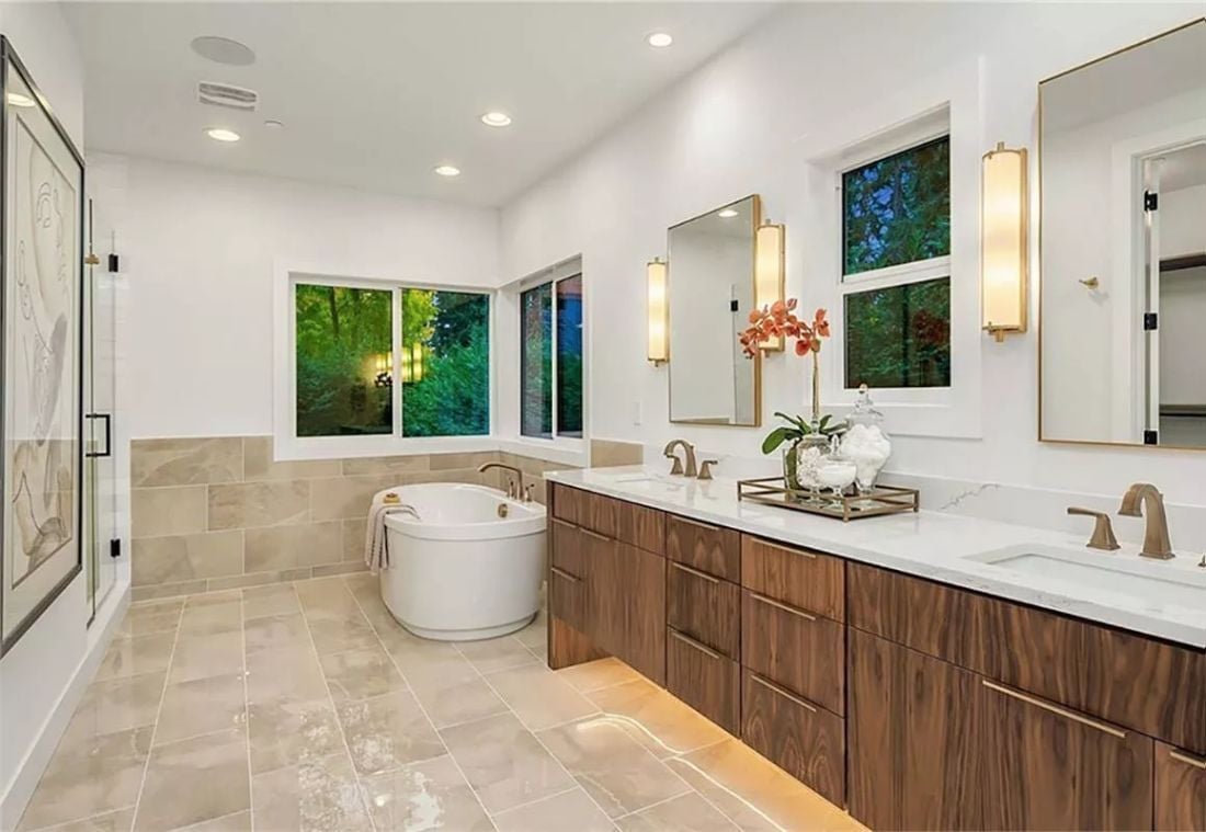 Floating Walnut Vanity and a Freestanding Tub Answering to No One