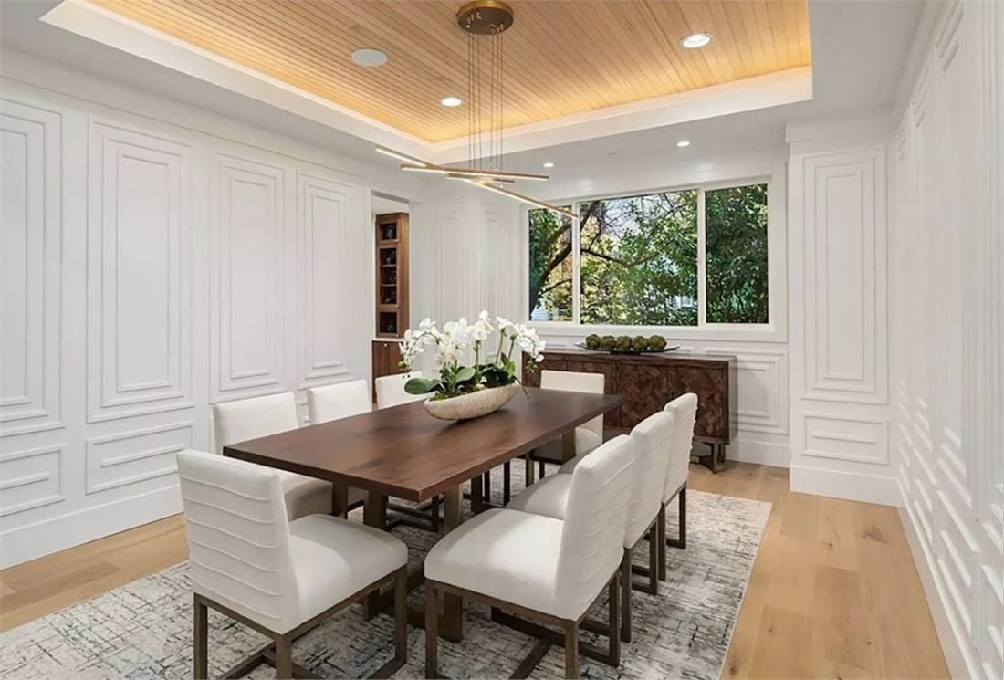 Wainscoting Panels and a Wood Tray Ceiling Earning Their Keep Together