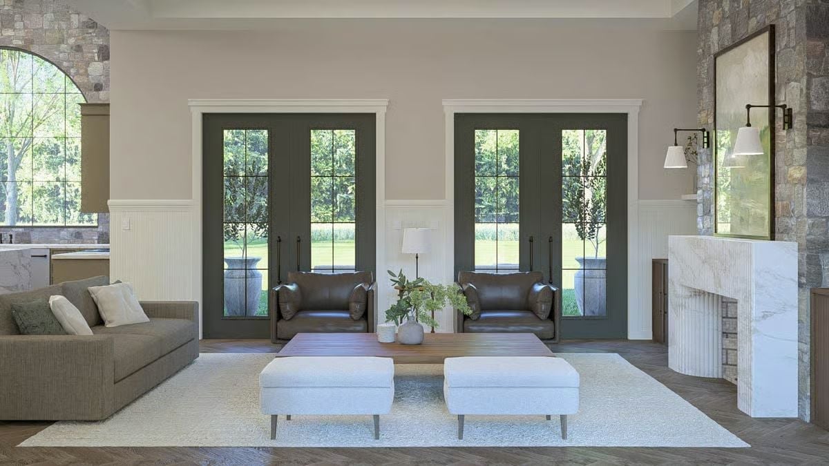 Dark French Doors and Marble Fireplace Share the Room Without Fighting