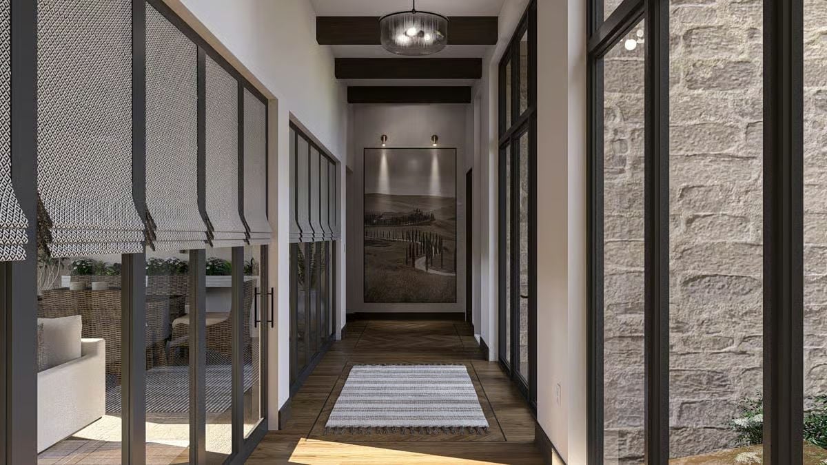 Dark Beams and Stone Walls Make This Hallway Feel Like a Mountain Retreat