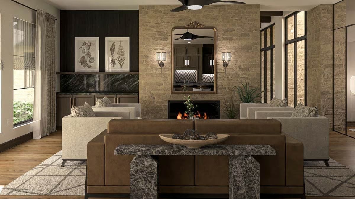 Stone, Leather, and Firelight Pull This Living Room Into Its Own World