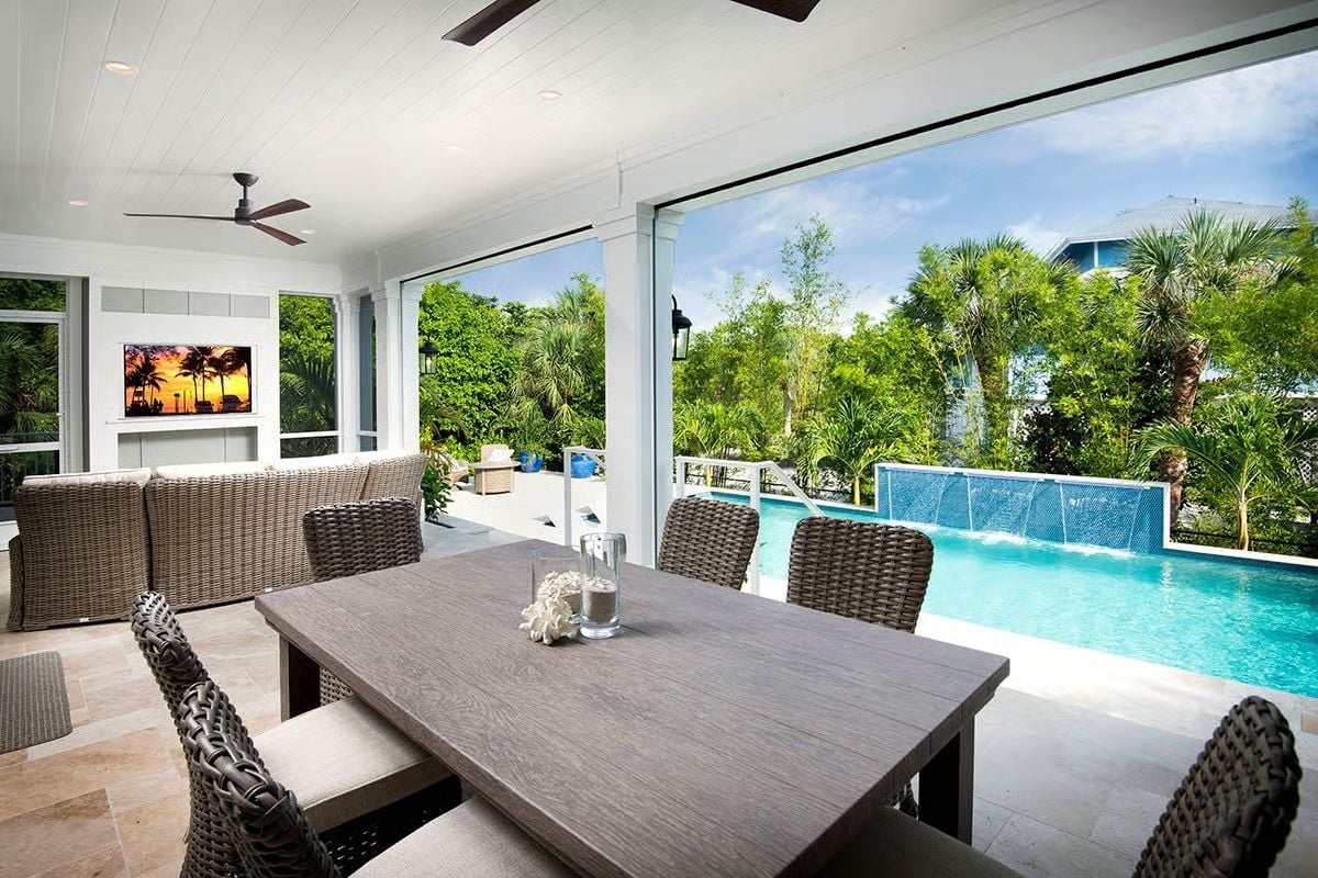 Outdoor Ceiling Fans and a Pool View Make Every Meal Feel Like a Reward