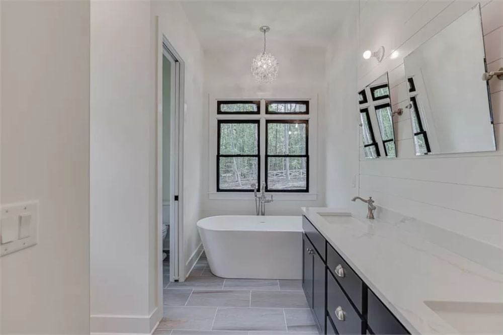 Freestanding Tub, Shiplap Walls, and a Chandelier That Pulls It All Together