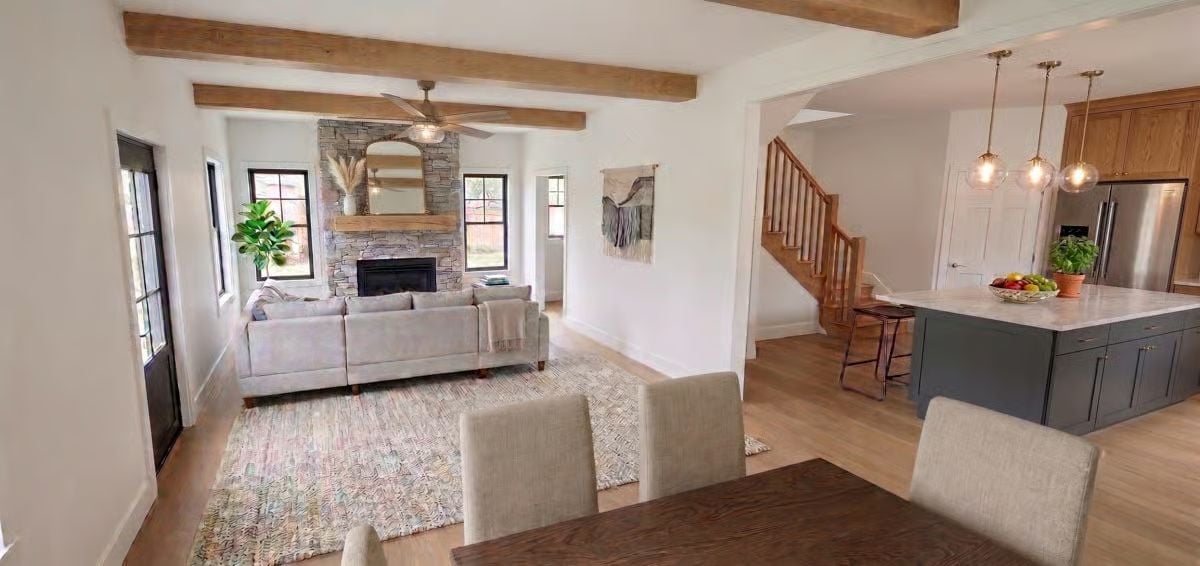 Exposed Beams, a Stone Fireplace, and an Open Plan That Earns Its Square Footage