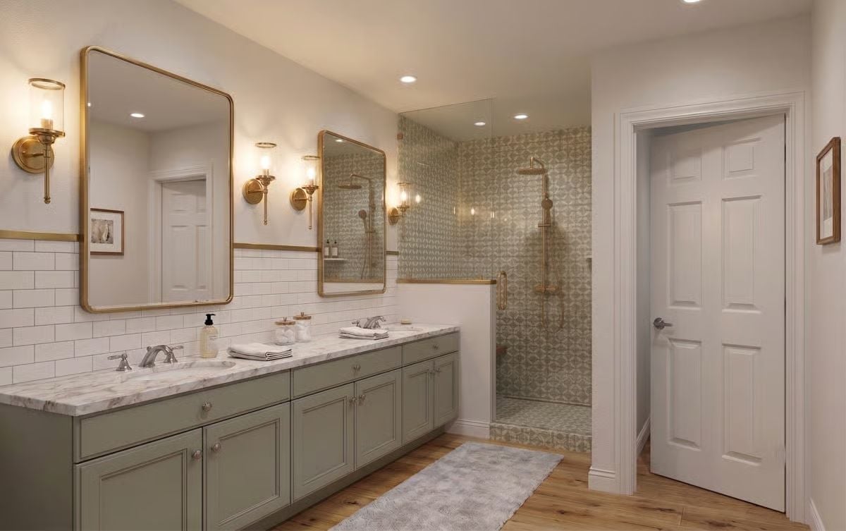 Sage Cabinets, Brass Sconces, and Patterned Tile That Ties the Whole Bathroom Together