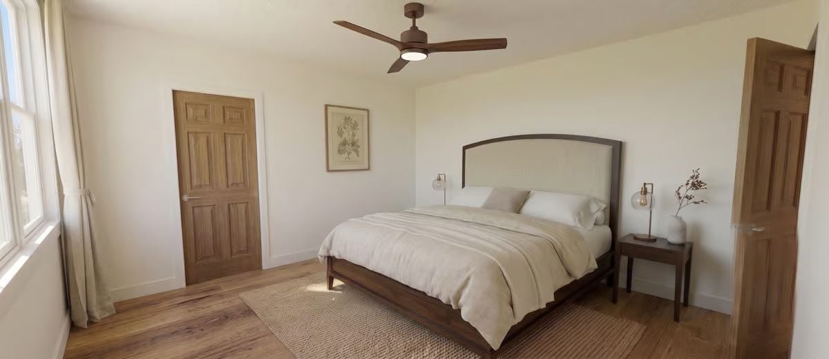 Warm Wood, Linen Bedding, and a Ceiling Fan That Pulls the Room Together