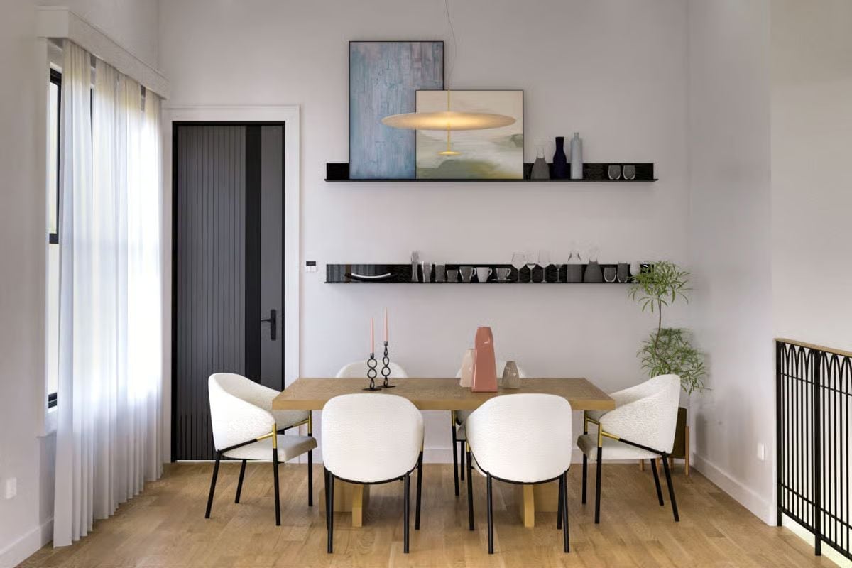 Black Shelving, Warm Wood Table, and a Pendant That Pulls It Together