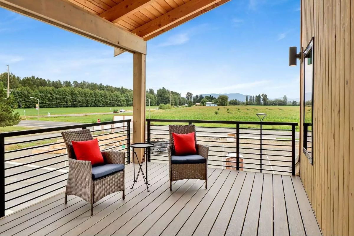 Covered Balcony With a Field View Does the Work a Living Room Tries to Do
