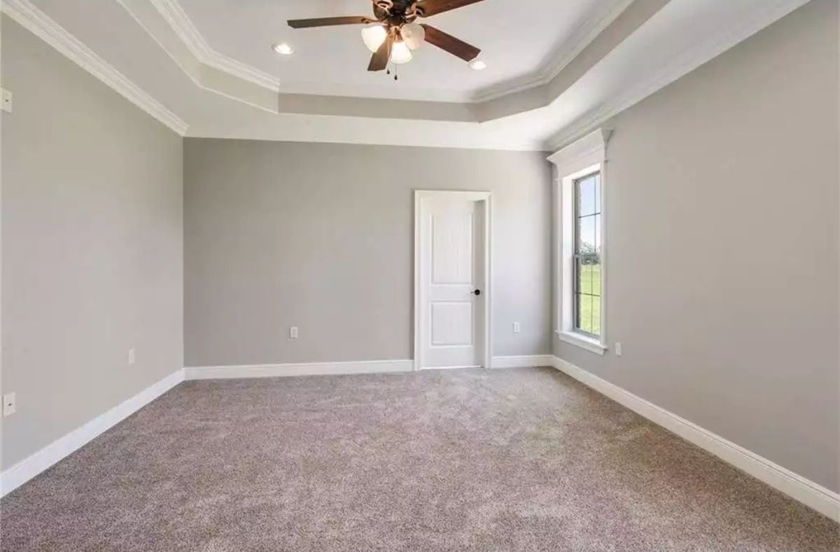 Tray Ceiling Does the Heavy Lifting in an Otherwise Empty Room