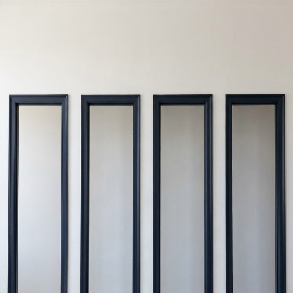 Painting Door Casings in a High-Contrast Color That Chops Up the Walls