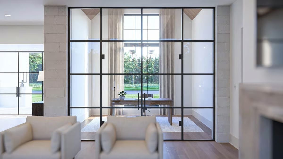 Crittall-Style Glass Walls That Let Two Rooms Share the Same Light