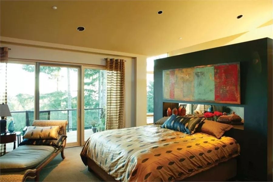 Teal Headboard Wall and Abstract Art Turn This Master Bedroom Into Something Personal