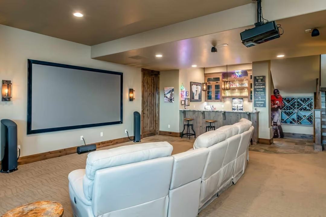 Projector Bar and White Leather Built for the Team That Actually Shows Up