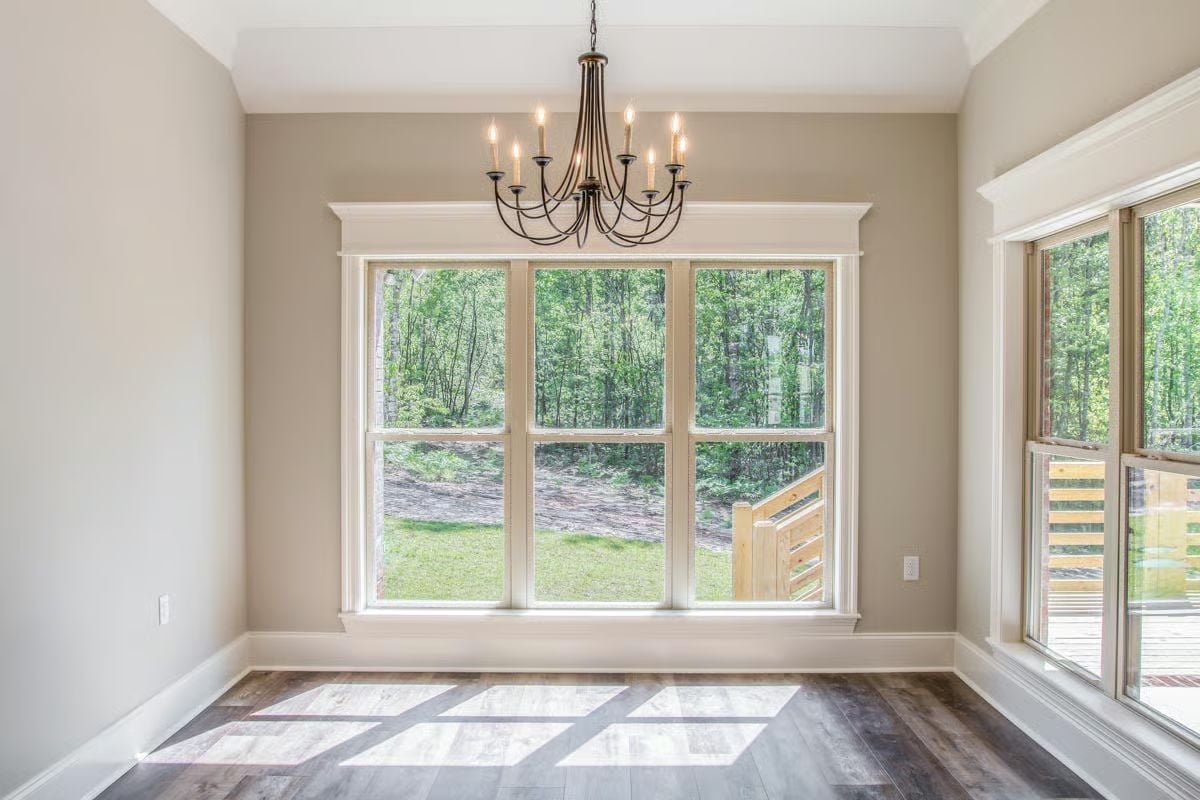 Candle-Style Chandelier and a Triple Window Worth Building Around