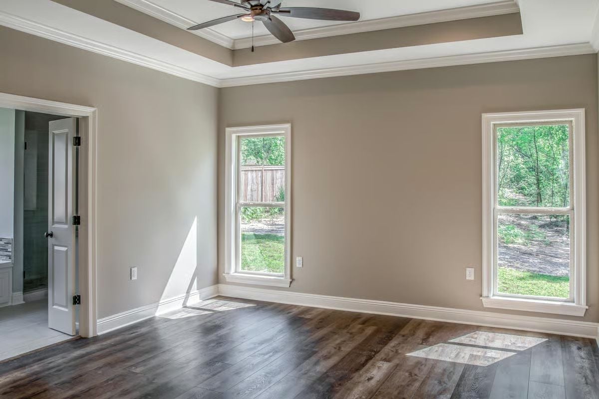 Tray Ceiling, Hardwood Floors, and Two Windows That Pull in the Yard