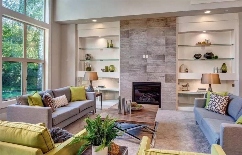 Lime Green Pillows and a Tiled Fireplace Wall Give This Living Room Its Edge