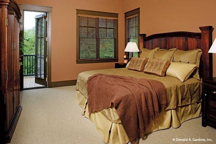 Walnut Headboard, Gold Bedding, and a Throw That Earns Its Place