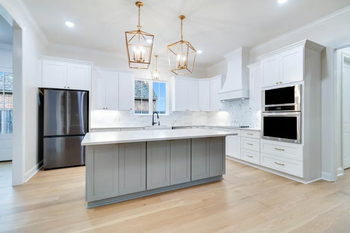 Gold Lanterns and a Gray Island That Pulls the Whole Kitchen Together