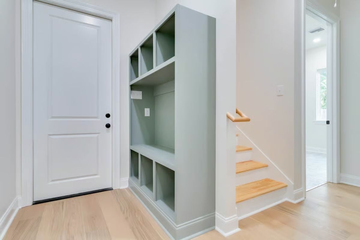 Mudroom Cubbies in Sage Green Earn Their Spot Right by the Front Door