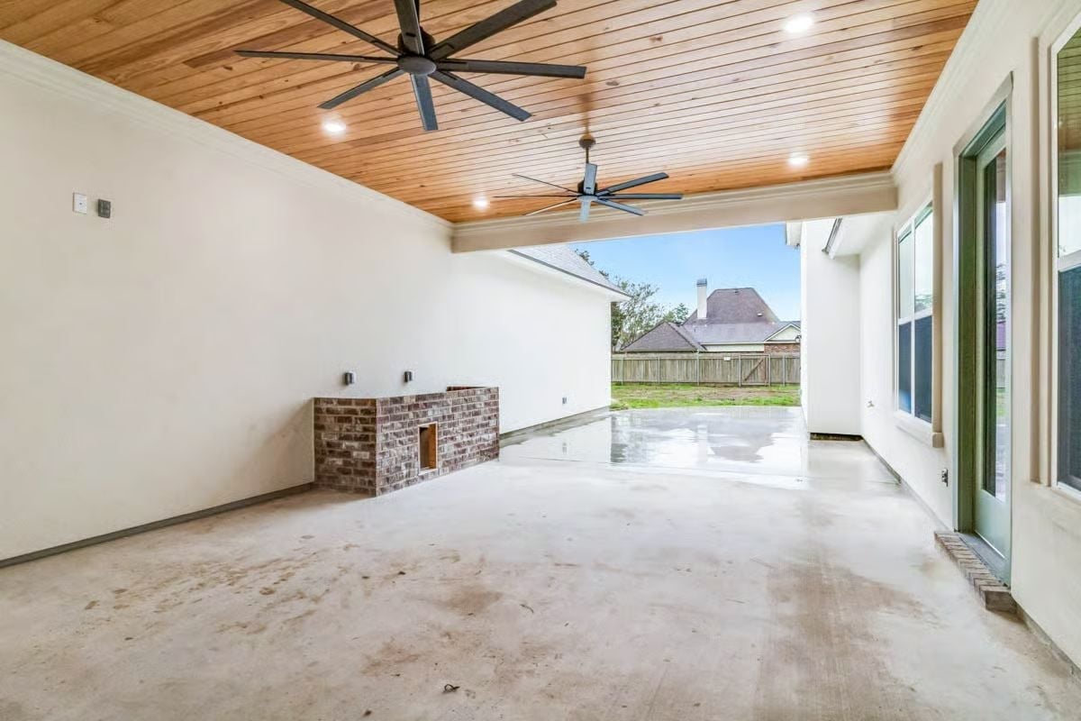 Tongue-and-Groove Ceiling with Two Big Fans Does the Heavy Lifting Out Here