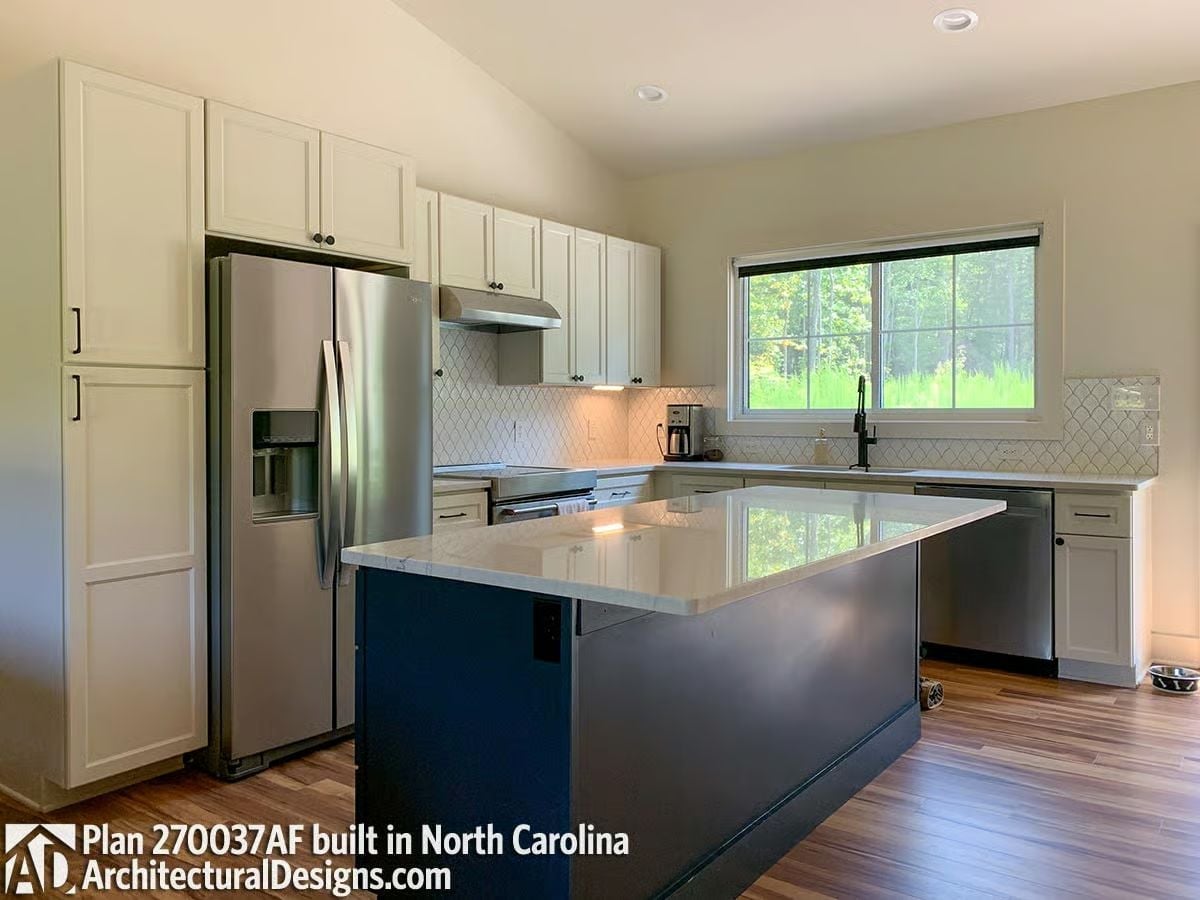 Navy Island, White Quartz, and a Window That Earns Its Place Above the Sink
