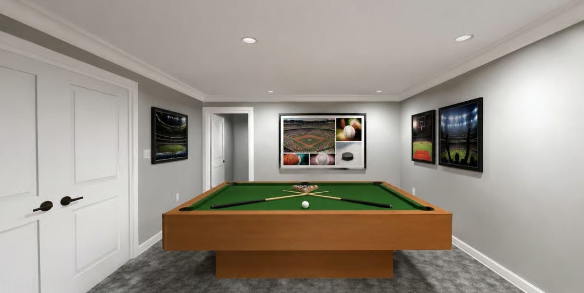 Pool Table, Sports Art, and a Basement Room That Doesn't Pretend to Be Anything Else