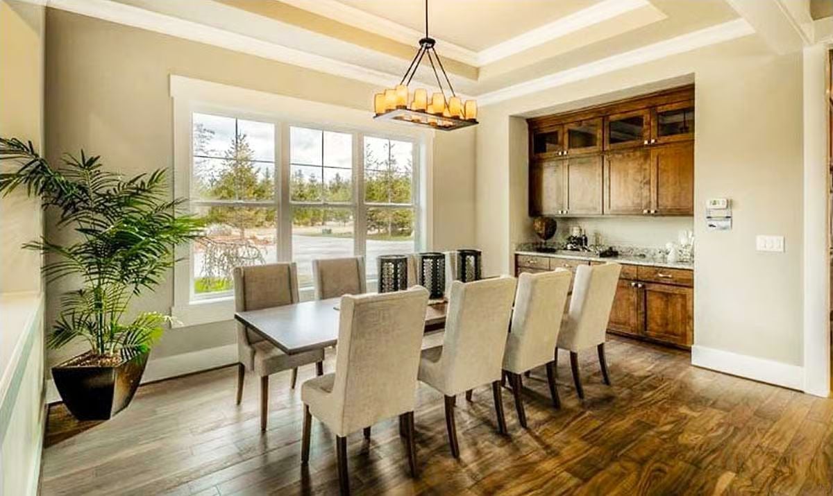 Candlelit Lanterns and Coffered Ceilings Give This Dining Room Its Lodge-Like Character